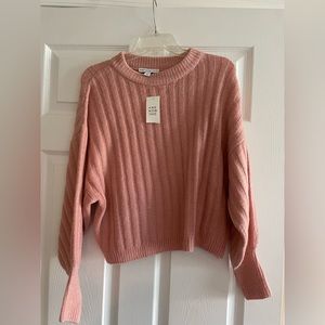 Pink sweater in size Small